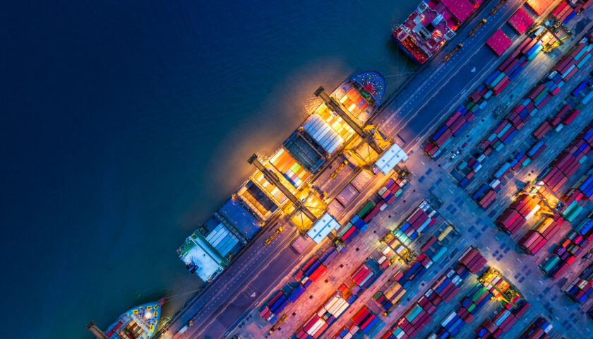 Container ship in import export and business logistics, By crane, Trade Port, Shipping cargo to harbor, Aerial view from drone, International transportation, Business logistics concept